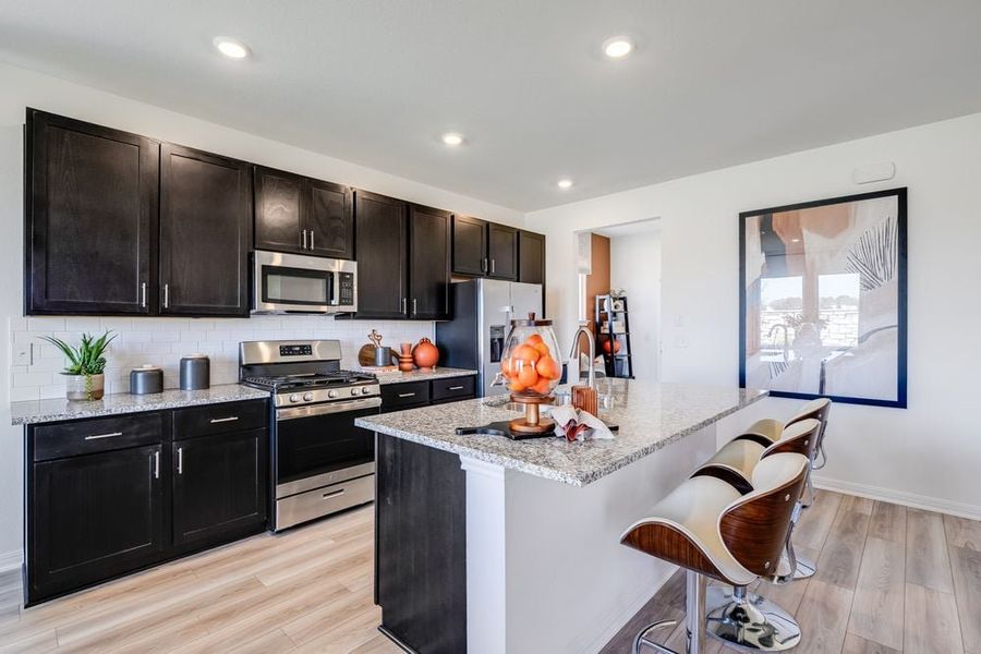 Representative furnished interior of a home built from the Kestrel by Taylor Morrison in Longview 40s, Del Valle (Image 3).