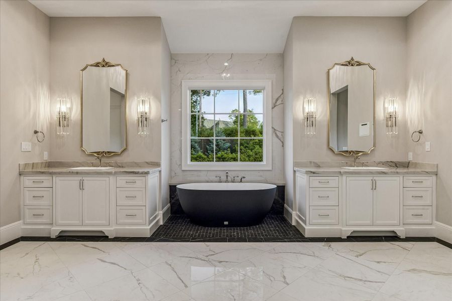 PRIMARY VANITES AND SOAKING TUB