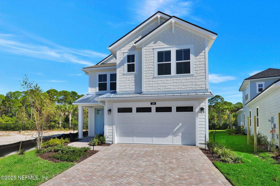 Front exterior of a new home in , Ponte Vedra, FL, highlighting curb appeal (Image 24).