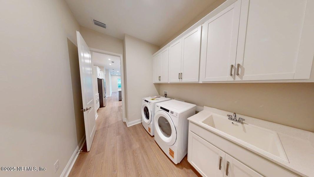 Furnished interior view inside a new home in RiverTown - WaterSong, St. Johns (Image 5). Furnished interior view inside a new home in RiverTown - WaterSong, St. Johns (Image 5).