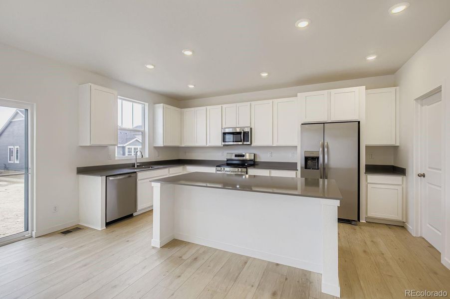 Furnished interior view inside a new home in Riano Ridge: The Pioneer Collection, Loveland (Image 6).