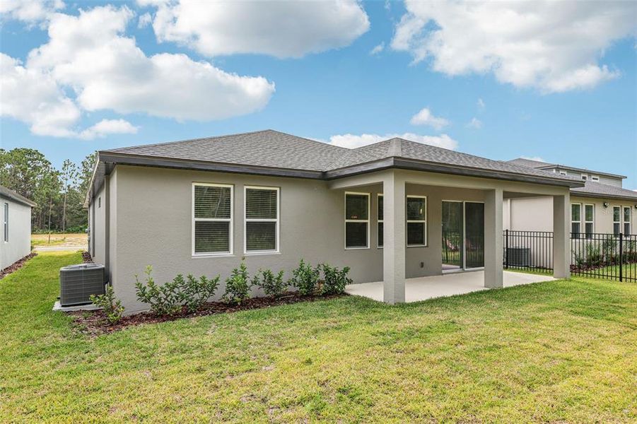 Exterior details and patio area of a home in , Ormond Beach (Image 25).