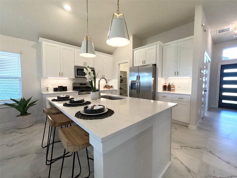 Representative photo: This image is of a model home featuring the same floor plan as the house currently under construction. Please note that colors, finishes, and upgrades may vary from the actual home being built.