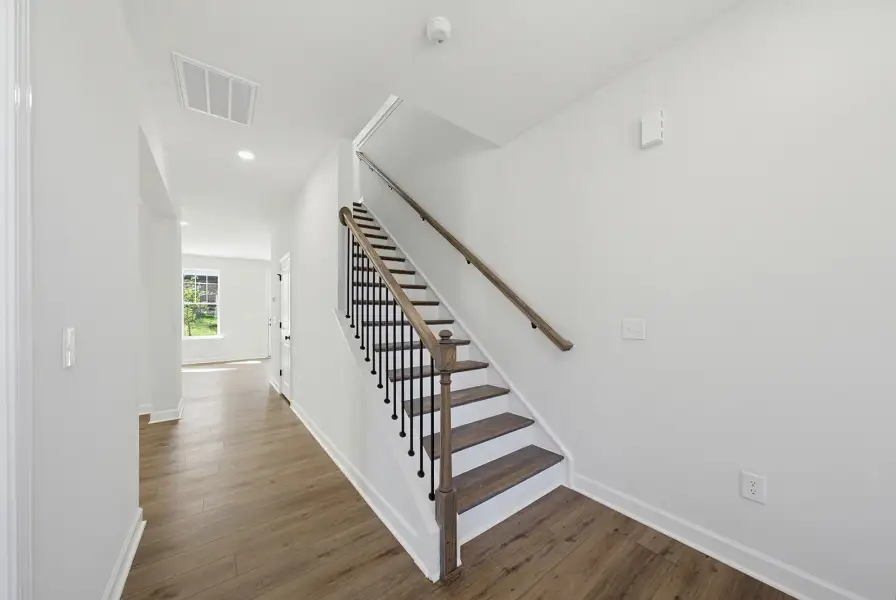 Spacious, unfurnished interior of a new home in Sweetbrier, Durham (Image 17).