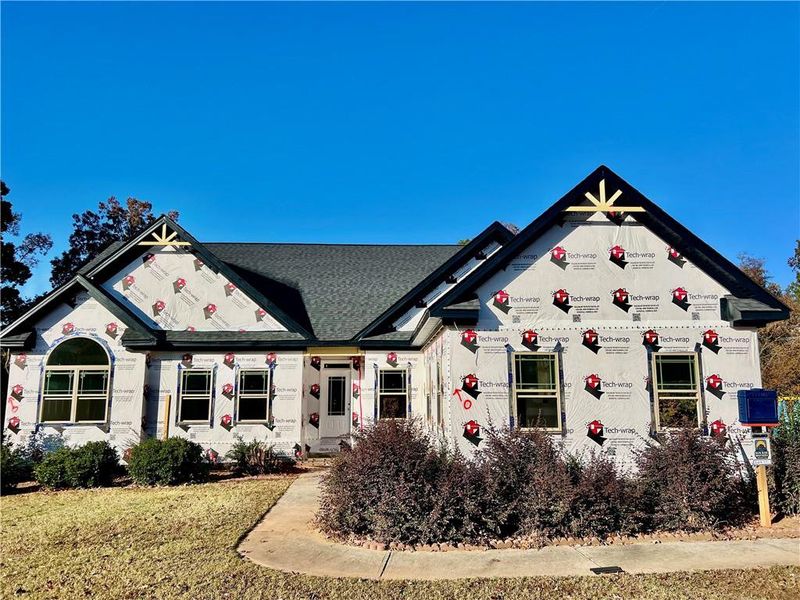 Front exterior of a new home in , Conyers, GA, highlighting curb appeal (Image 2).