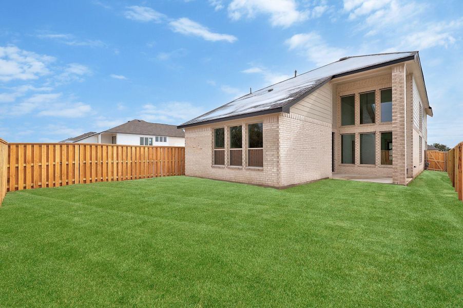 Exterior details and patio area of a home in Parmer Ranch, Georgetown (Image 21).