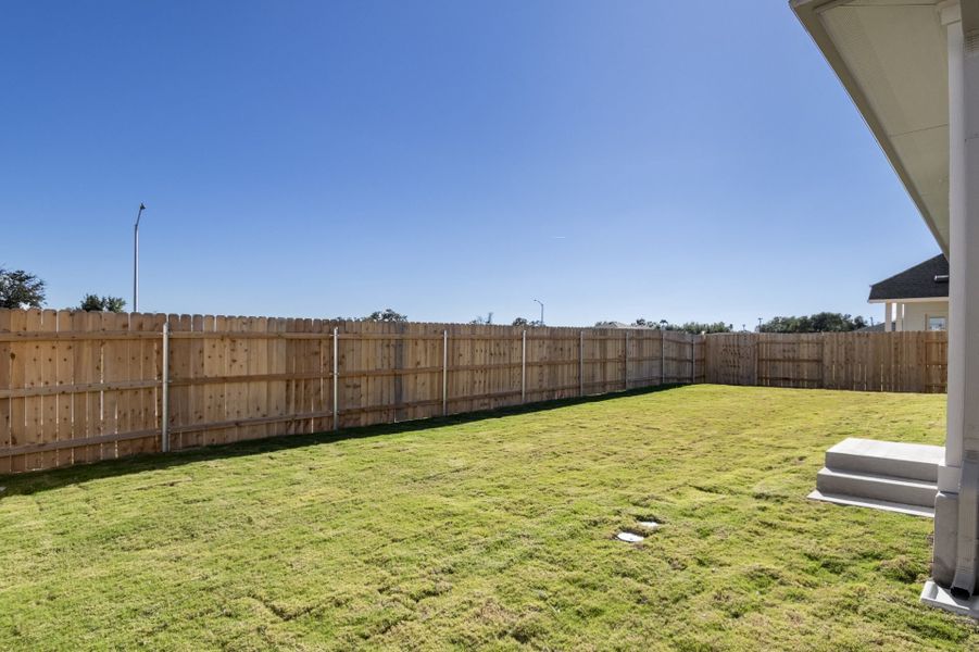 Exterior details and patio area of a home in Grande Estates, Bertram (Image 29).