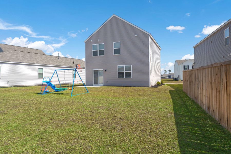 Exterior details and patio area of a home in , Summerville (Image 3).