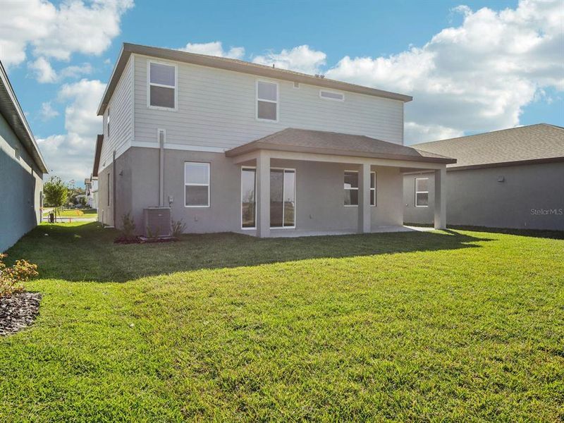Exterior details and patio area of a home in Coasterra - Reserve Series, Palmetto (Image 22).