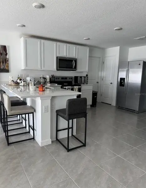Furnished interior view inside a new home in , Ocala (Image 8).