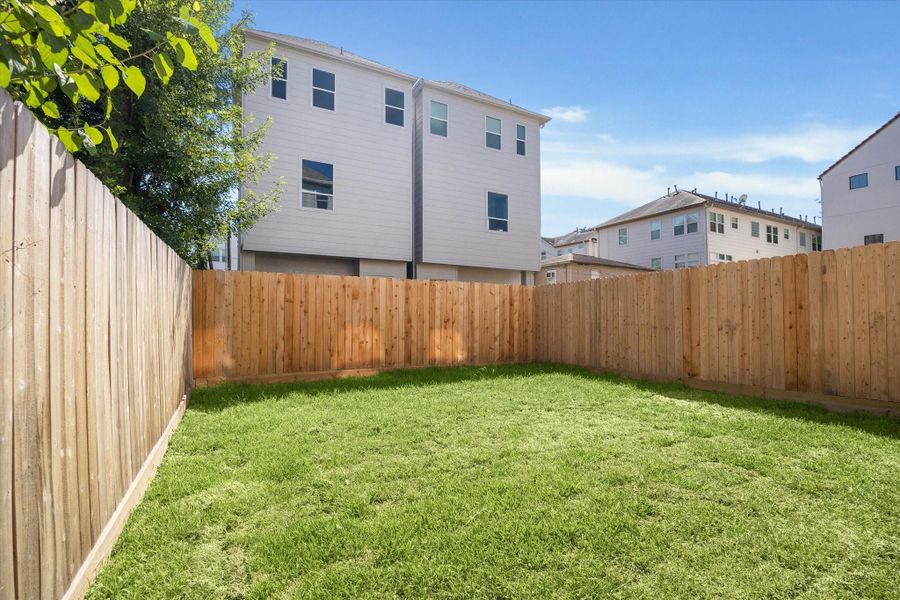 A hard to find YARD! A space perfect for kids and pets.