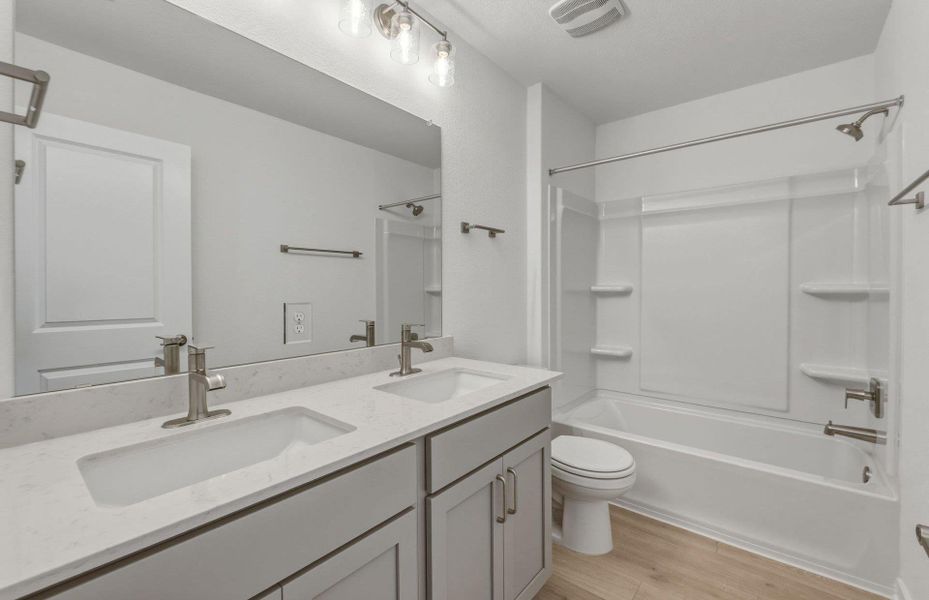 Furnished interior view inside a new home in Cameron Place, Manor (Image 8).