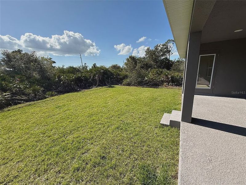 Exterior details and patio area of a home in South Gulf Cove, Port Charlotte (Image 19).