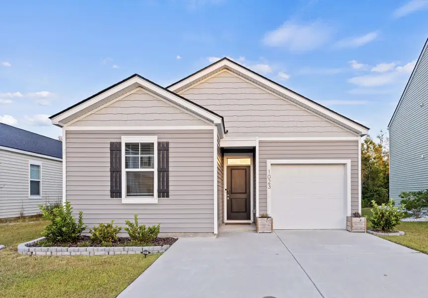 Front exterior of a new home in , Ladson, SC, highlighting curb appeal (Image 2).