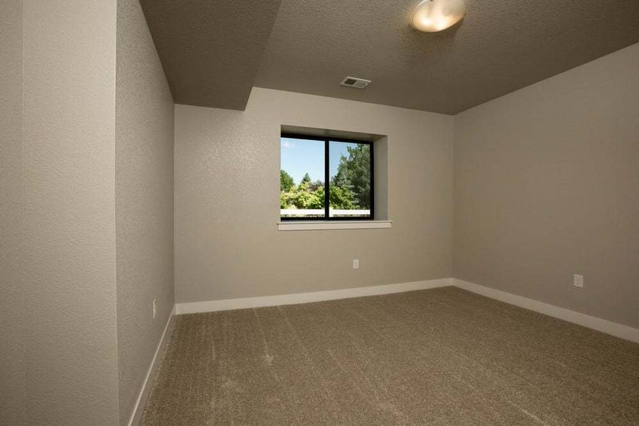 Bedroom in Optional Finished Basement - Not Actual Home - Finishes May Vary