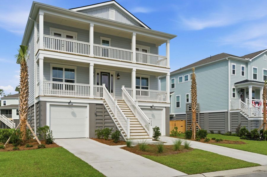 Front exterior of a new home in Liberty Hill Farm, Mount Pleasant, SC, highlighting curb appeal (Image 23).