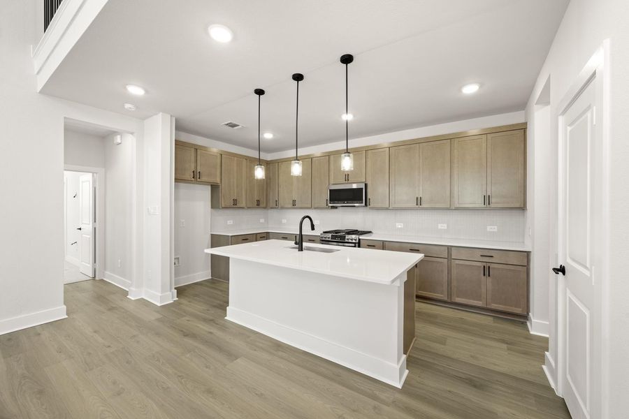 Furnished interior view inside a new home in Terrace Collection at Harvest, Argyle (Image 5).