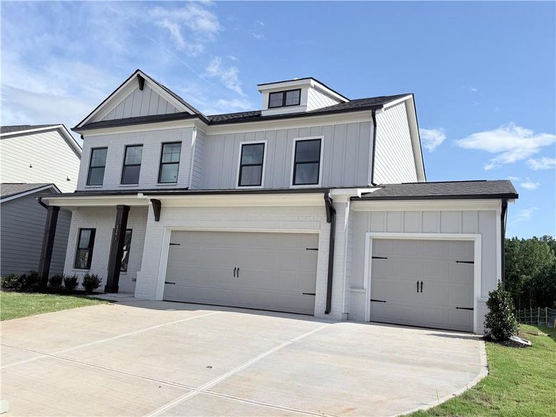 Front exterior of a new home in , Gainesville, GA, highlighting curb appeal (Image 26).