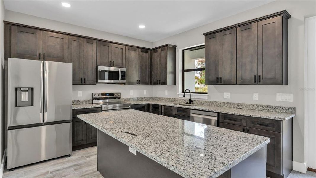 Furnished interior view inside a new home in , Winter Haven (Image 11). Furnished interior view inside a new home in , Winter Haven (Image 11).