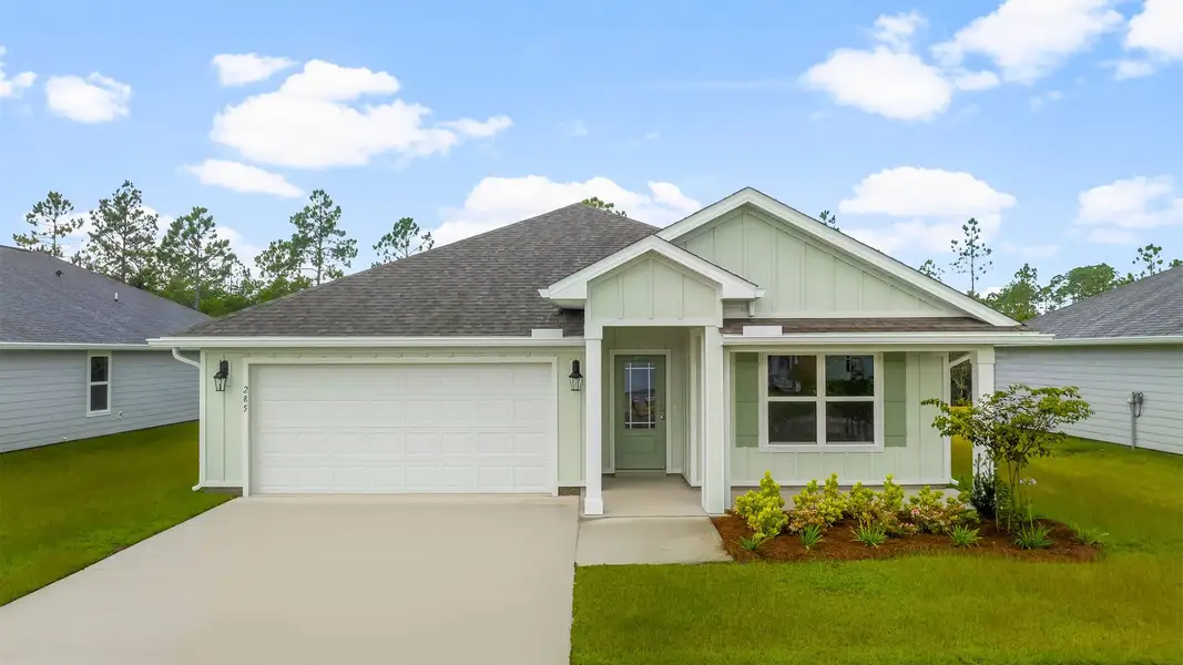 Front exterior of a new home in Palmetto Bluff, Port Saint Joe, FL, highlighting curb appeal (Image 1). Front exterior of a new home in Palmetto Bluff, Port Saint Joe, FL, highlighting curb appeal (Image 1).