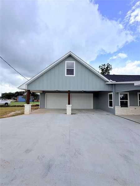 Front exterior of a new home in , Brazoria, TX, highlighting curb appeal (Image 1). Front exterior of a new home in , Brazoria, TX, highlighting curb appeal (Image 1).