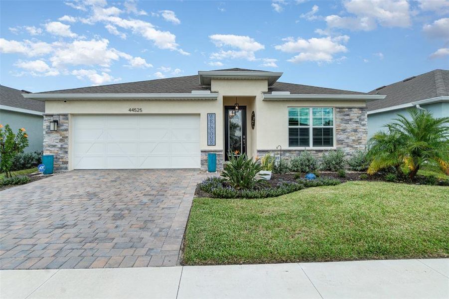 Front exterior of a new home in , Punta Gorda, FL, highlighting curb appeal (Image 20).