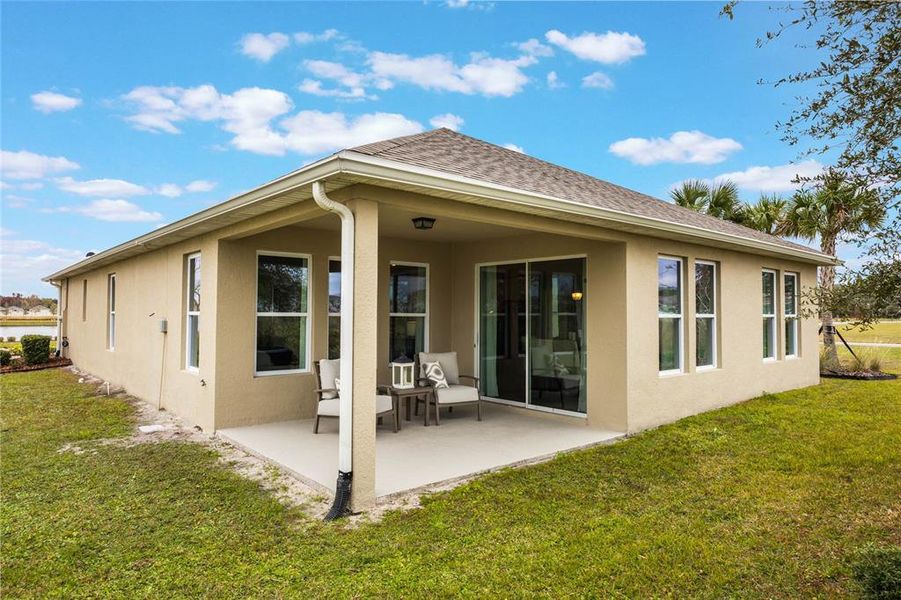 Front exterior of a new home in Kindred, Kissimmee, FL, highlighting curb appeal (Image 2).