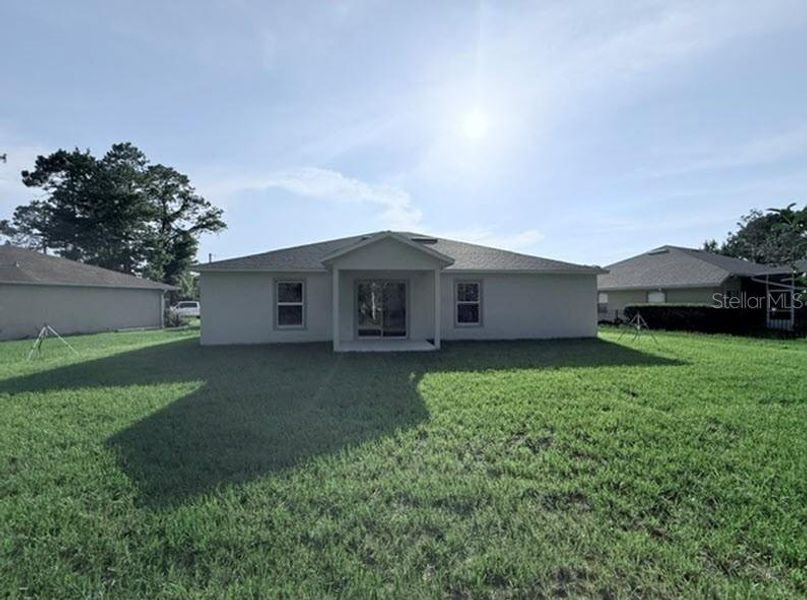 Exterior details and patio area of a home in Palm Coast, Palm Coast (Image 3).
