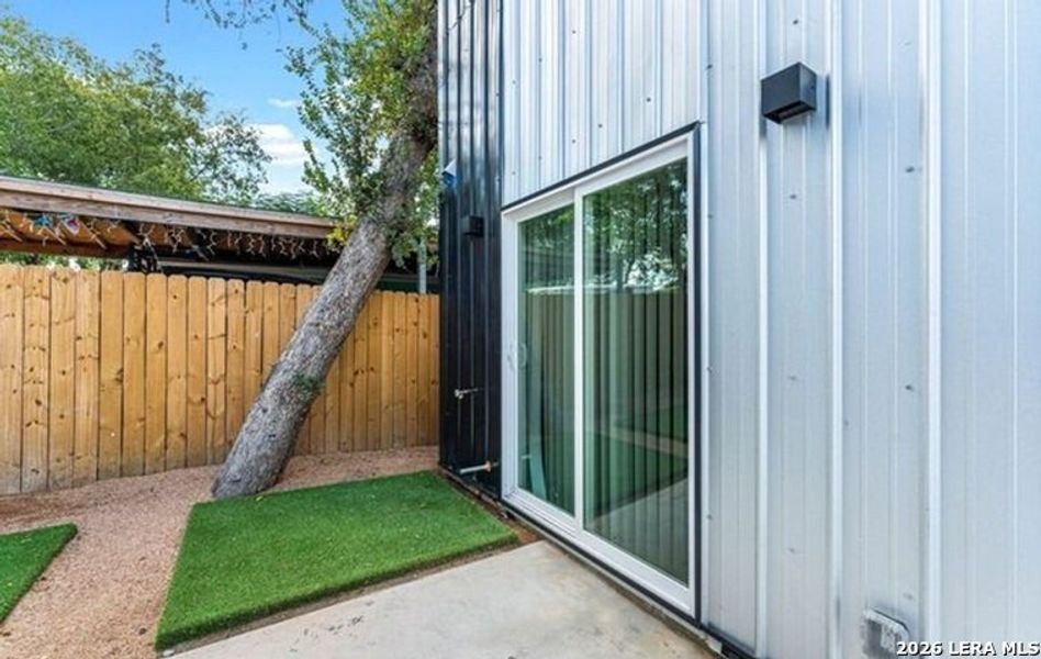 Exterior details and patio area of a home in , San Antonio (Image 28).