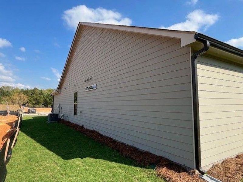 Exterior details and patio area of a home in Soleil Belmont Park, Canton (Image 4). Exterior details and patio area of a home in Soleil Belmont Park, Canton (Image 4).