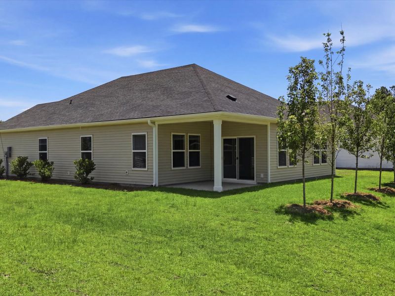 Exterior details and patio area of a home in Palmetto Place, Longs (Image 3).