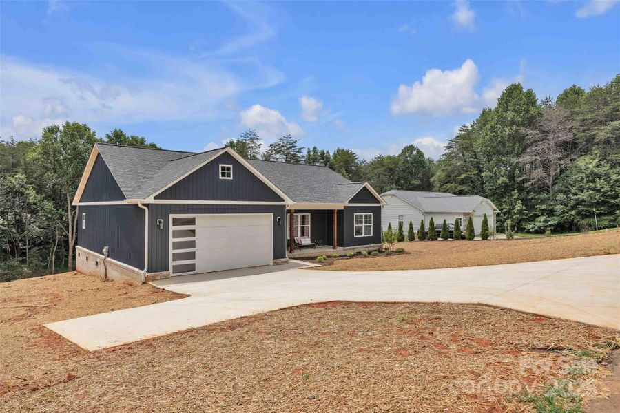 Front exterior of a new home in , Taylorsville, NC, highlighting curb appeal (Image 29).