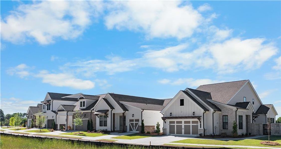 Front exterior of a new home in , Hoschton, GA, highlighting curb appeal (Image 30).
