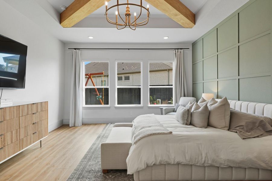 Primary bedroom view from bathroom entrance. Beautiful accent wall included. Primary bedroom view from bathroom entrance. Beautiful accent wall included.