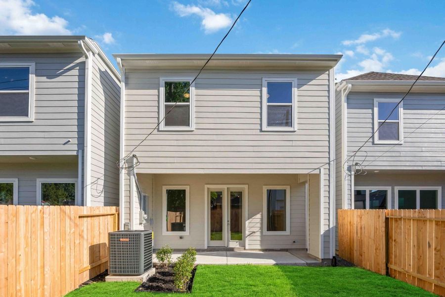 Rear view shows how the indoor and outdoor living spaces work together.