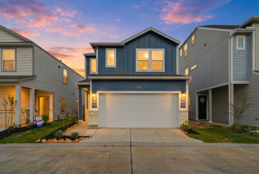 A house with a garage. A house with a garage.