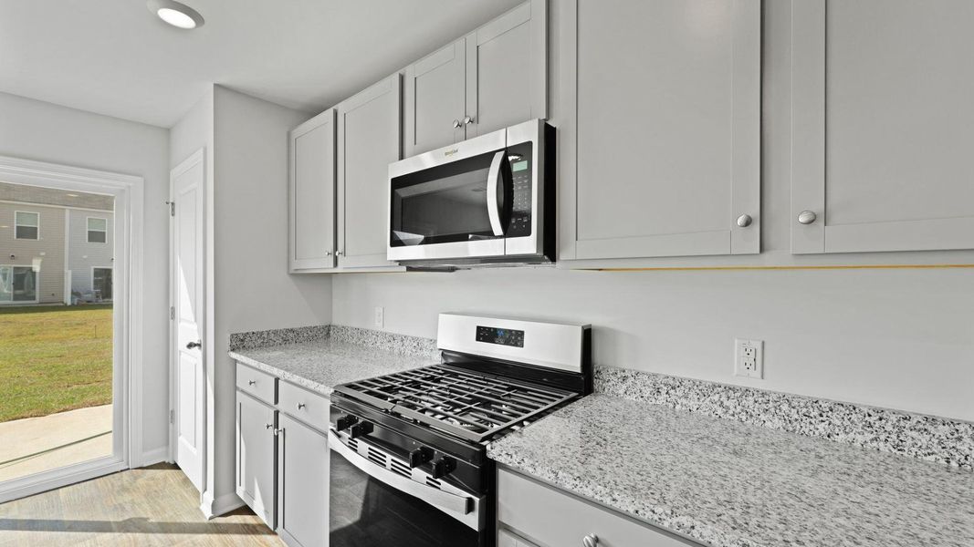 Furnished interior view inside a new home in Pine Hills Townhomes at Cane Bay, Summerville (Image 11).