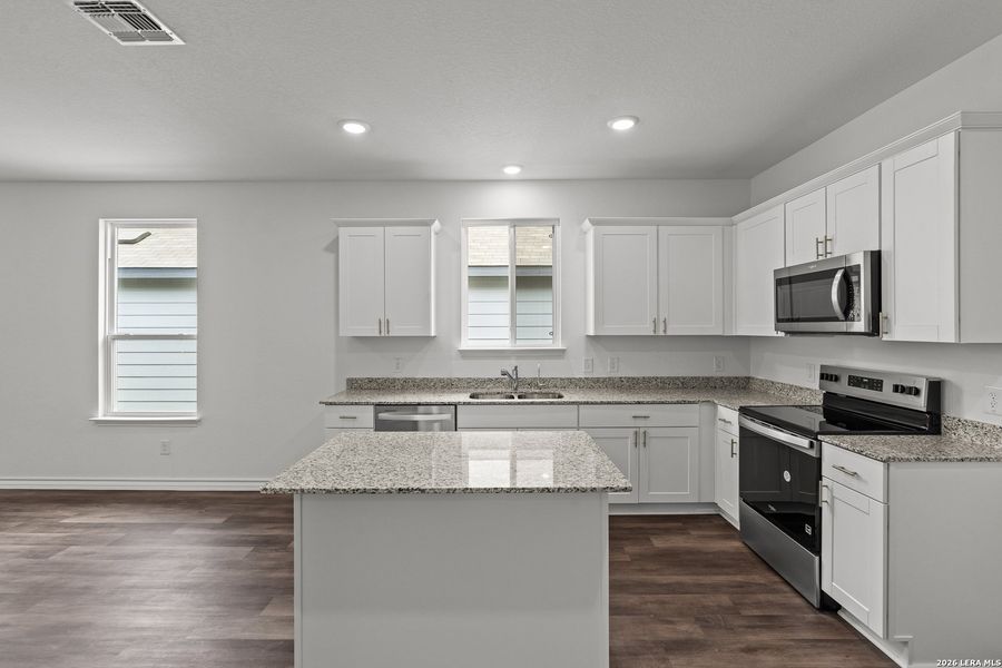 Furnished interior view inside a new home in Cinco Lakes, San Antonio (Image 4).