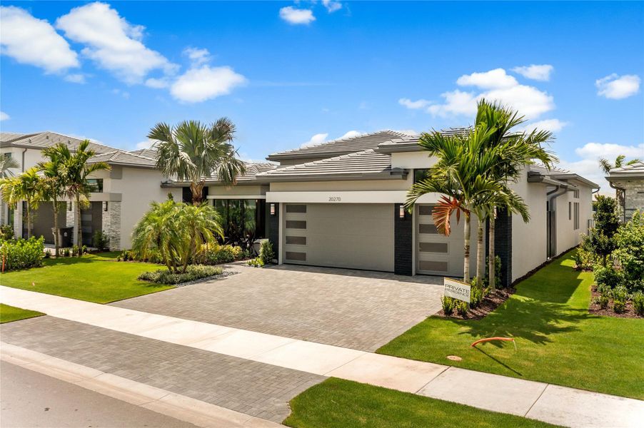 Front exterior of a new home in , Boca Raton, FL, highlighting curb appeal (Image 33). Front exterior of a new home in , Boca Raton, FL, highlighting curb appeal (Image 33).