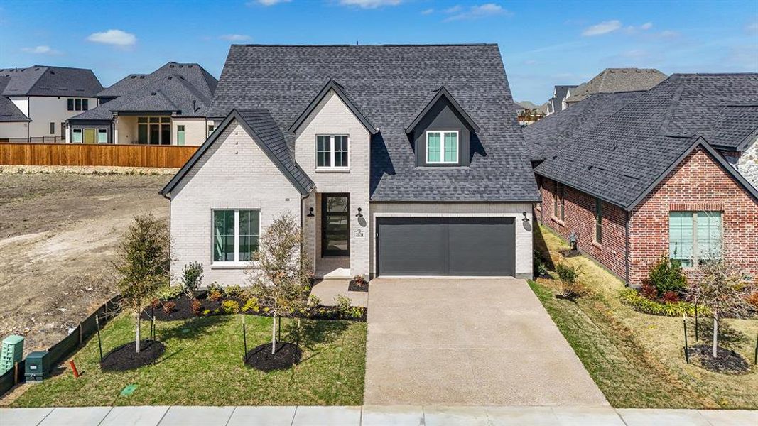 Front exterior of a new home in Brookhollow West, Prosper, TX, highlighting curb appeal (Image 24).