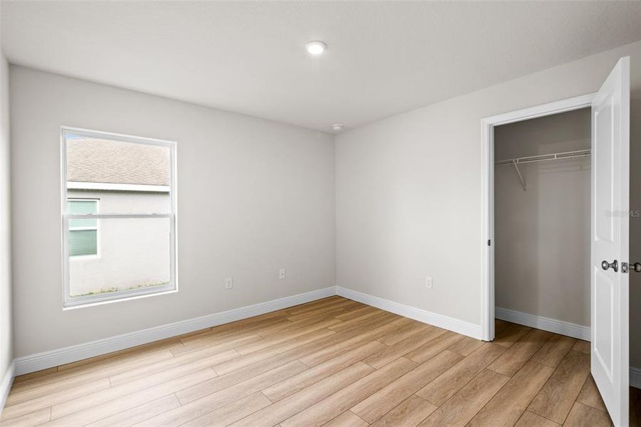 Spacious, unfurnished interior of a new home in SummerCrest, Ocala (Image 27).