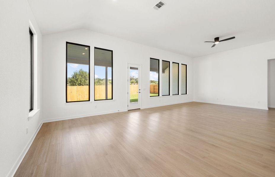 Representative unfurnished interior of a home built from the Dobbin by Pulte Homes in 6 Creeks, Kyle (Image 24).