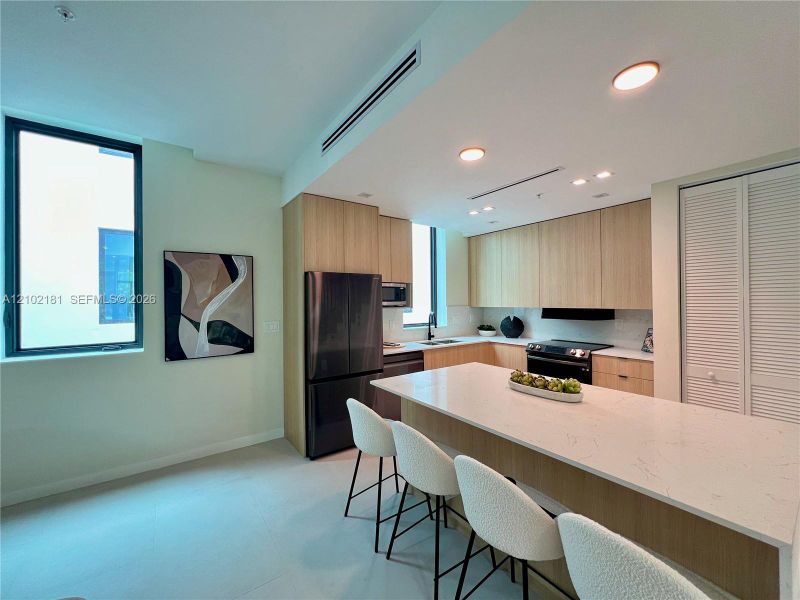 Furnished interior view inside a new home in , Miami (Image 8).