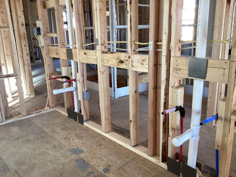 In-progress construction of a new home in The Homestead at Lariat, Liberty Hill, TX (Image 19).