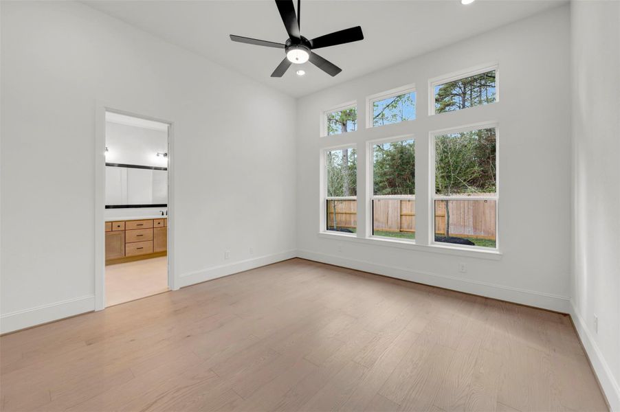 Spacious, unfurnished interior of a new home in The Woodlands Hills - Premier Collection, Willis (Image 27).