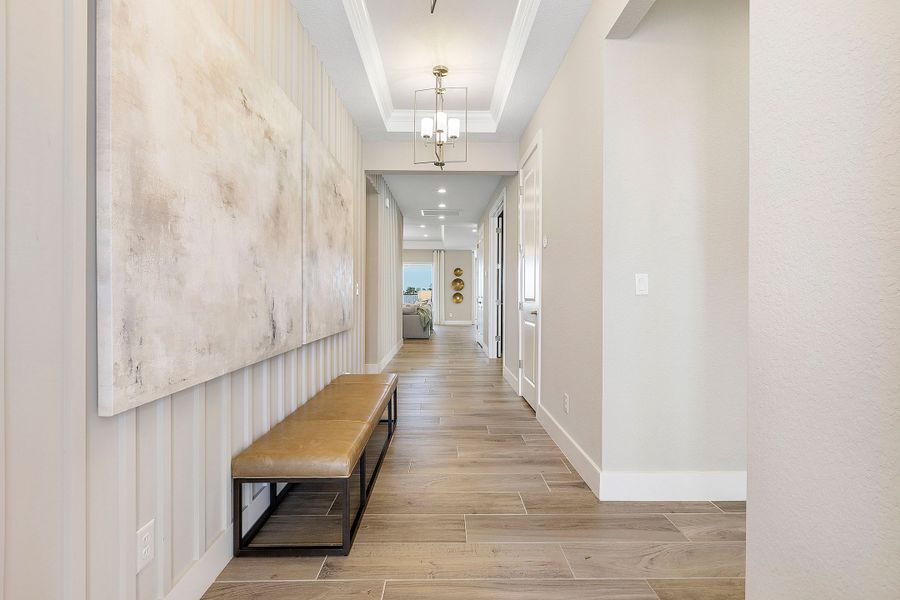 Representative furnished interior of a home built from the Charlotte by William Ryan Homes in The Sanctuary – Royal Collection, Punta Gorda (Image 10). Representative furnished interior of a home built from the Charlotte by William Ryan Homes in The Sanctuary – Royal Collection, Punta Gorda (Image 10).