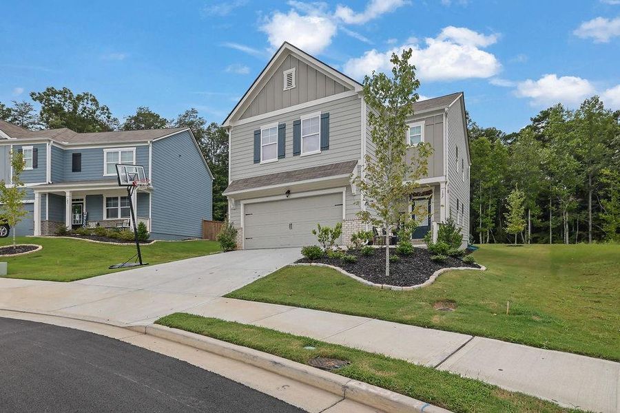 Front exterior of a new home in , Dawsonville, GA, highlighting curb appeal (Image 20).