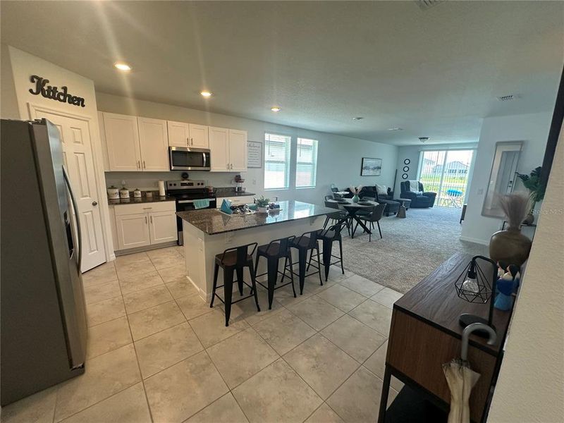 Furnished interior view inside a new home in Villamar - Signature Series, Winter Haven (Image 9).