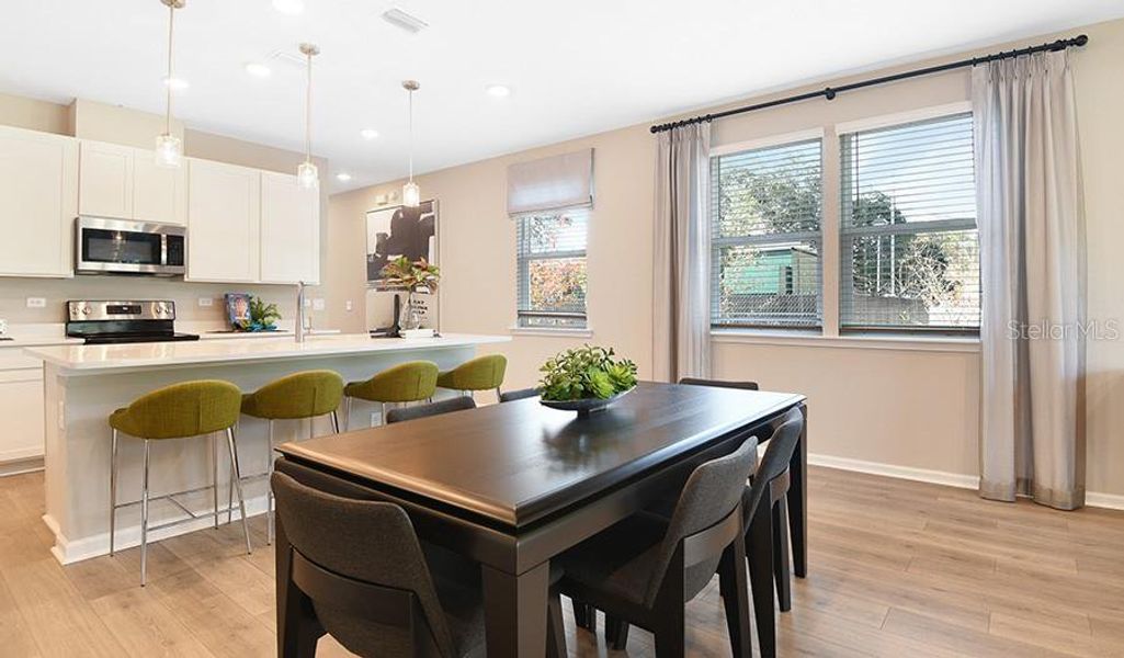 Furnished interior view inside a new home in Seasons at Shores of Lake Dell, Dundee (Image 14).
