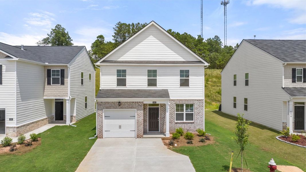 Front exterior of a new home in Highland Hills, Graniteville, SC, highlighting curb appeal (Image 1). Front exterior of a new home in Highland Hills, Graniteville, SC, highlighting curb appeal (Image 1).